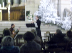 The guitarist and flautist who performed at the free midday concert at Trinity Church sounded heavenly.  They also looked angelic in the dim light, as captured by my camera.